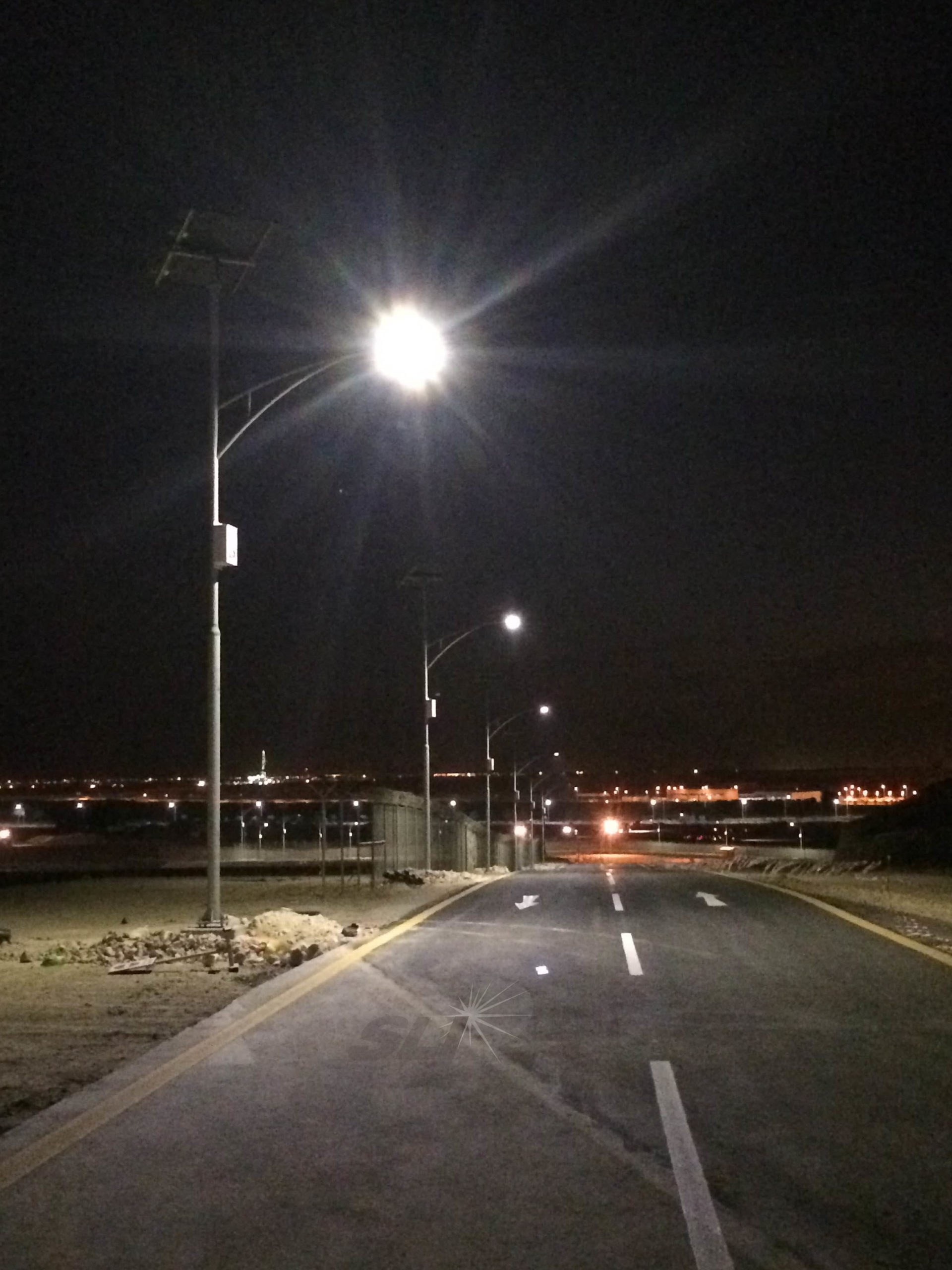 Solar street lights illuminated at night in Saudi Arabia