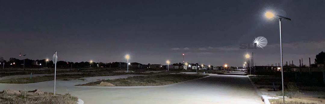 Turtle-safe amber solar lighting installed along a coastal pathway