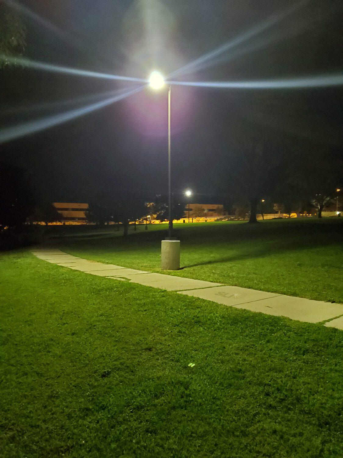 Solar pathway light installed along a walking path at Kirtland Park, Albuquerque NM